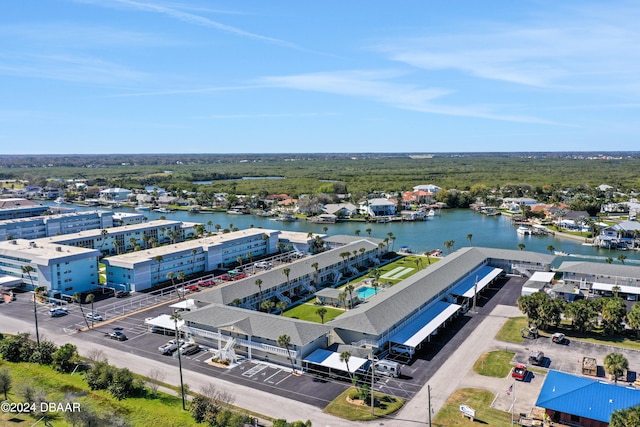 drone / aerial view with a water view