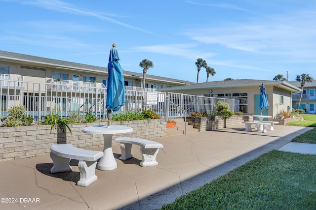 view of community with a patio area