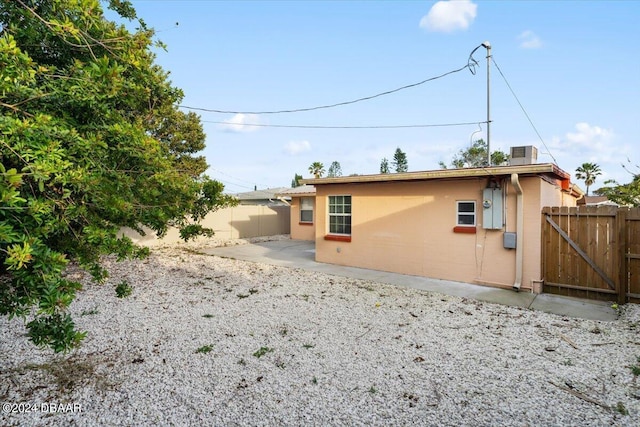 rear view of house with a patio