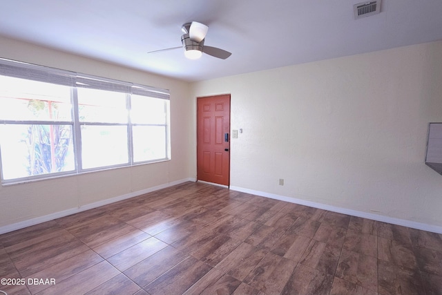 empty room with ceiling fan