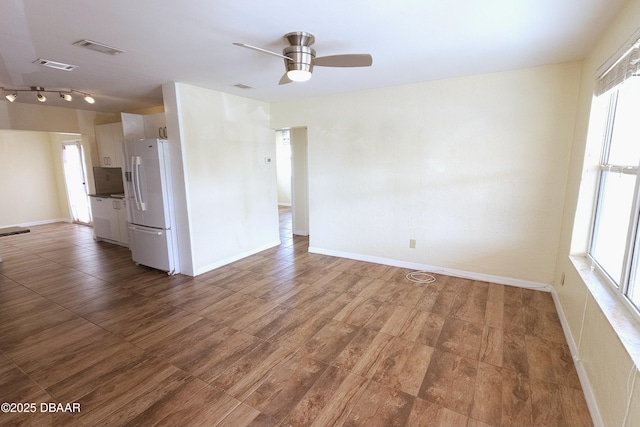 interior space featuring ceiling fan