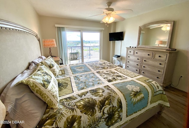 2615 S Atlantic Ave Unit 6G, Daytona Beach Shores, FL 32118 - bedroom with access to exterior, wood finished floors, and a ceiling fan