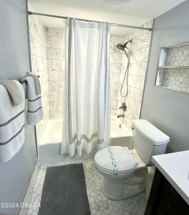 2615 S Atlantic Ave Unit 6G, Daytona Beach Shores, FL 32118 - bathroom with shower / bath combo with shower curtain, toilet, and vanity