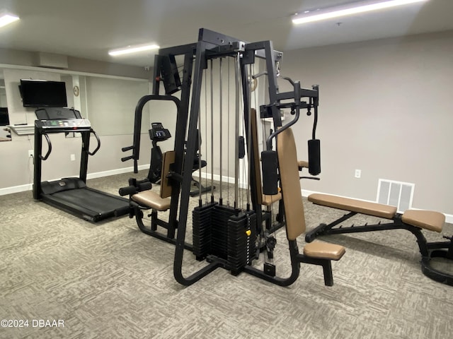 2615 S Atlantic Ave Unit 6G, Daytona Beach Shores, FL 32118 - workout room featuring carpet floors and baseboards