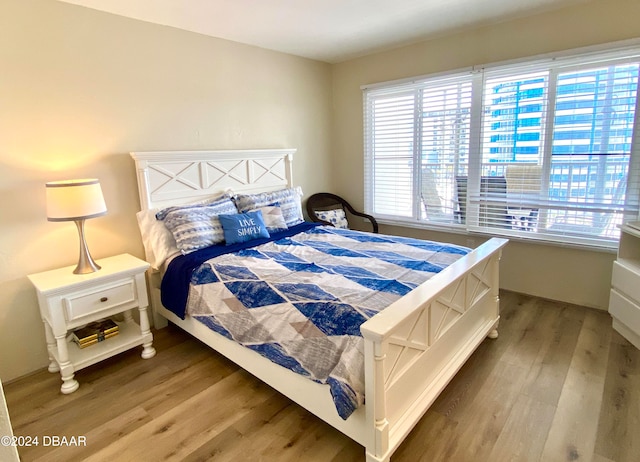 bedroom featuring hardwood / wood-style floors