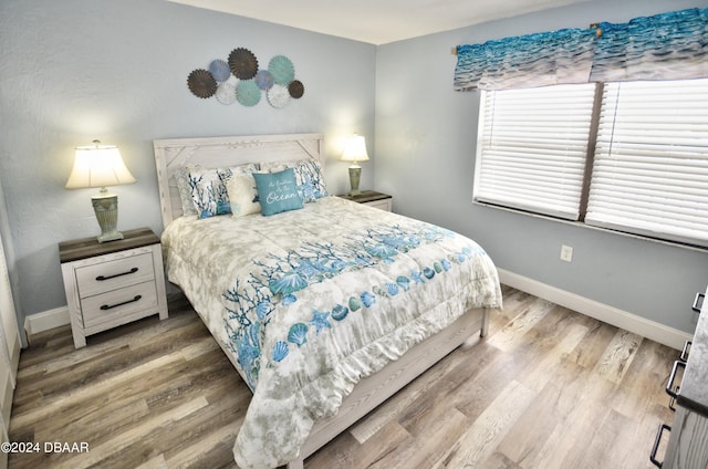 bedroom featuring hardwood / wood-style floors