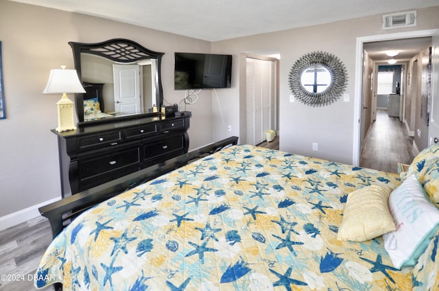 bedroom featuring light wood-type flooring