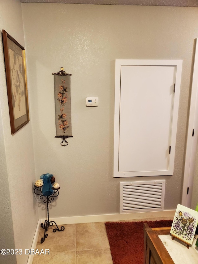 interior space featuring tile patterned flooring