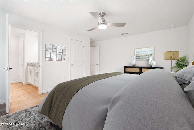 bedroom featuring light hardwood / wood-style floors and ceiling fan