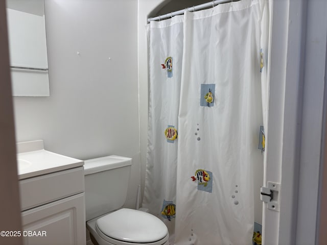 5500 Ocean Shore Blvd Unit 18, Ormond Beach, FL 32176 - bathroom with a shower with shower curtain, vanity, and toilet