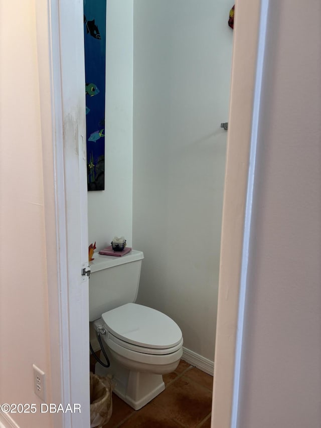 5500 Ocean Shore Blvd Unit 18, Ormond Beach, FL 32176 - bathroom featuring toilet and tile patterned floors