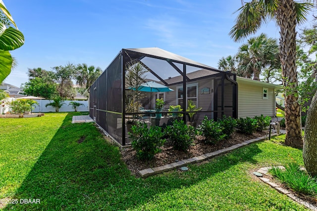 64 Alberta Ave, Ponce Inlet, FL 32127 - rear view of house with glass enclosure