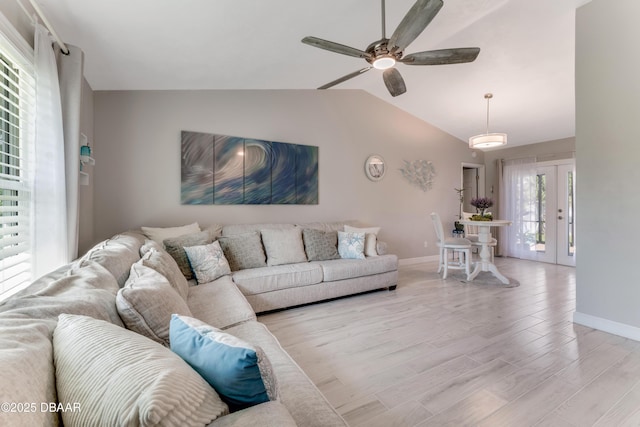 64 Alberta Ave, Ponce Inlet, FL 32127 - living room featuring baseboards, a ceiling fan, lofted ceiling, and light wood-style flooring
