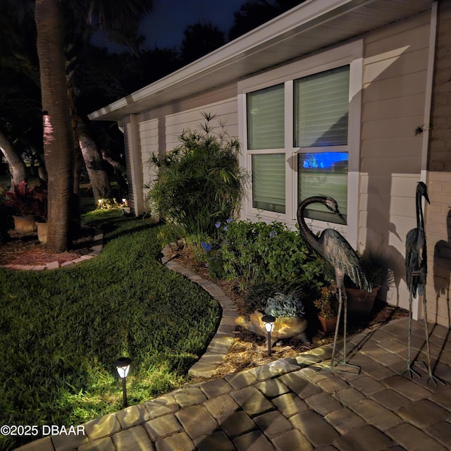 64 Alberta Ave, Ponce Inlet, FL 32127 - view of exterior entry at twilight