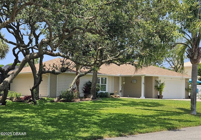 64 Alberta Ave, Ponce Inlet, FL 32127 - ranch-style home featuring brick siding, an attached garage, and a front lawn