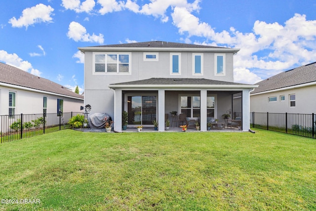 137 Azure Mist Way, Daytona Beach, FL 32124 - rear view of house with a fenced backyard, stucco siding, and a sunroom