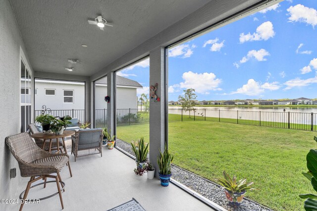 137 Azure Mist Way, Daytona Beach, FL 32124 - sunroom featuring a water view and ceiling fan