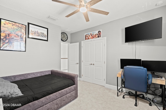 carpeted bedroom with ceiling fan