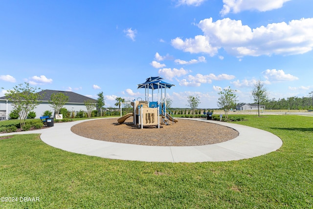 view of play area with a yard