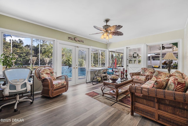 sunroom with french doors and ceiling fan