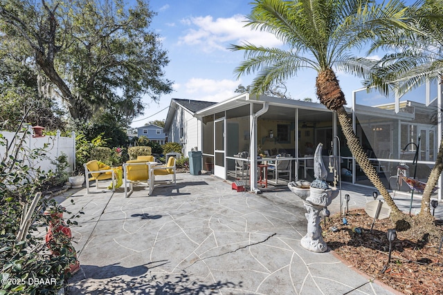 view of patio / terrace with a sunroom and glass enclosure