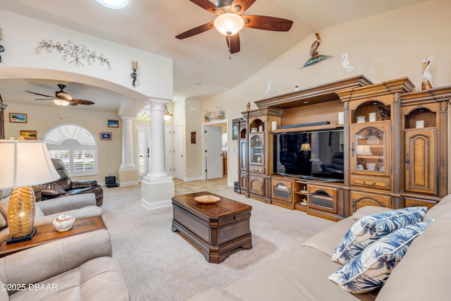 406 Phillips Creek Ln, New Smyrna Beach, FL 32168 - living room with ceiling fan, decorative columns, light carpet, and lofted ceiling