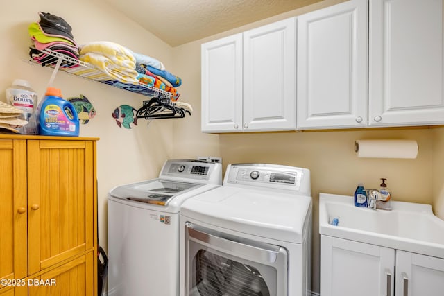 406 Phillips Creek Ln, New Smyrna Beach, FL 32168 - laundry room with washer and clothes dryer and cabinet space