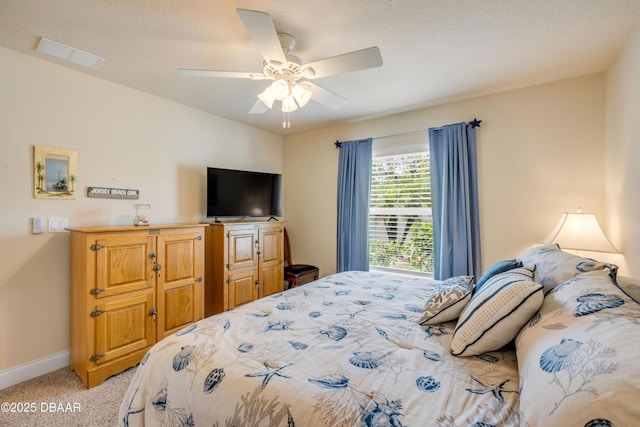 406 Phillips Creek Ln, New Smyrna Beach, FL 32168 - bedroom featuring light colored carpet and ceiling fan