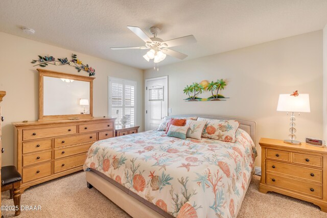 406 Phillips Creek Ln, New Smyrna Beach, FL 32168 - bedroom featuring light colored carpet and a ceiling fan