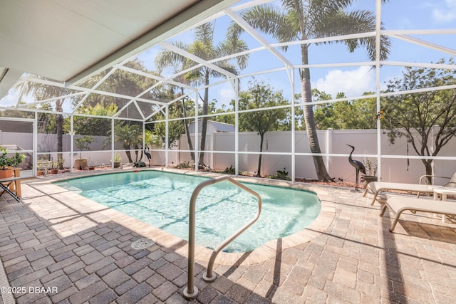 406 Phillips Creek Ln, New Smyrna Beach, FL 32168 - view of swimming pool featuring a patio, a fenced backyard, and a lanai