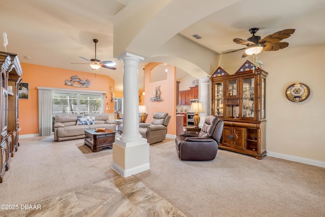 406 Phillips Creek Ln, New Smyrna Beach, FL 32168 - living area with a ceiling fan, ornate columns, arched walkways, light colored carpet, and lofted ceiling