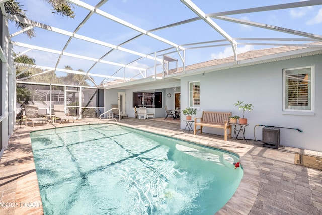 406 Phillips Creek Ln, New Smyrna Beach, FL 32168 - swimming pool featuring a patio and a lanai