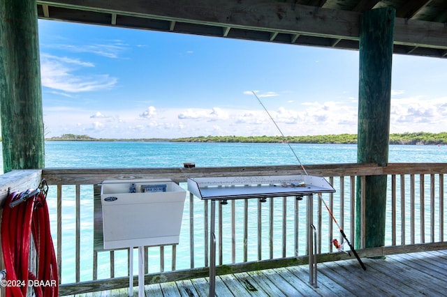 deck featuring a water view