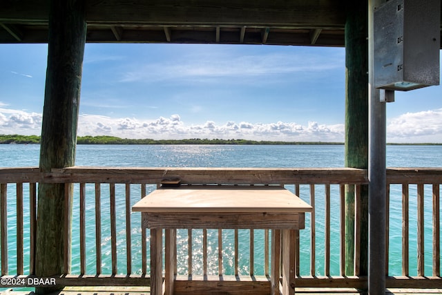 dock area featuring a water view