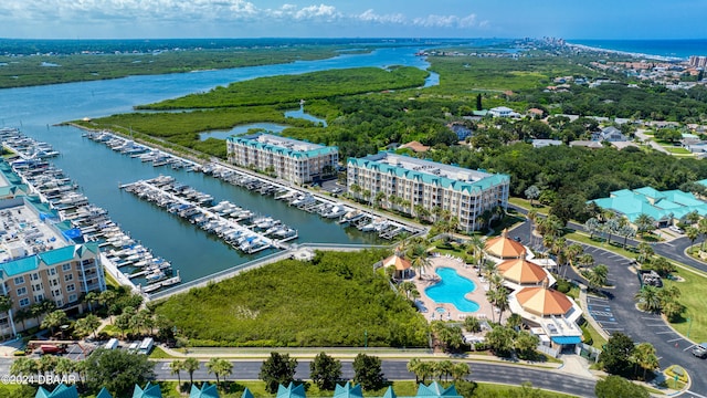 drone / aerial view with a water view