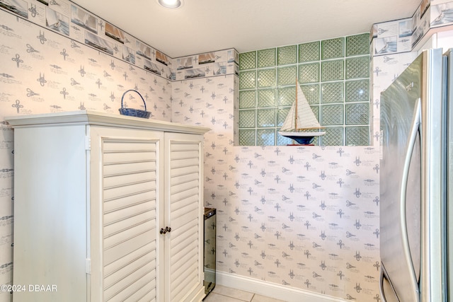 bathroom with tile patterned flooring