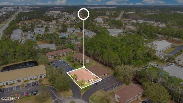 birds eye view of property with a residential view