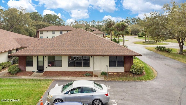 view of front of house featuring a shingled roof