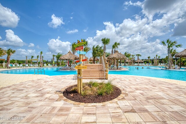 544 Good Life Way, Daytona Beach, FL 32124 - community pool with a gazebo and a patio area