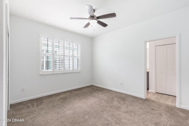 544 Good Life Way, Daytona Beach, FL 32124 - spare room with light colored carpet, a ceiling fan, and baseboards