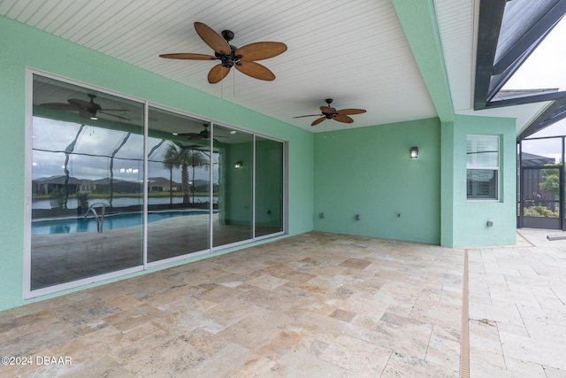 544 Good Life Way, Daytona Beach, FL 32124 - view of patio / terrace with ceiling fan, a lanai, and an outdoor pool