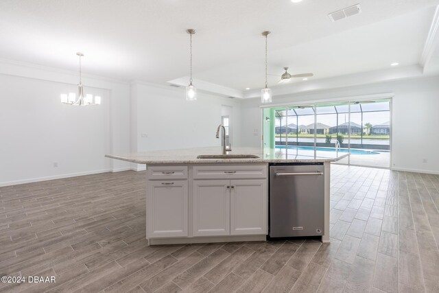 544 Good Life Way, Daytona Beach, FL 32124 - kitchen featuring a sink, dishwasher, light wood-type flooring, open floor plan, and crown molding