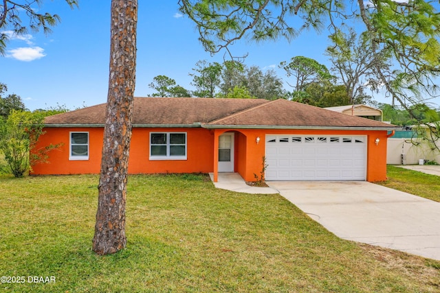 ranch-style house with a garage and a front yard