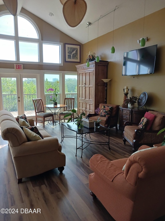 living room with french doors, high vaulted ceiling, dark wood-type flooring, and ceiling fan