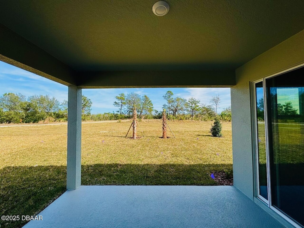 view of yard with a patio area