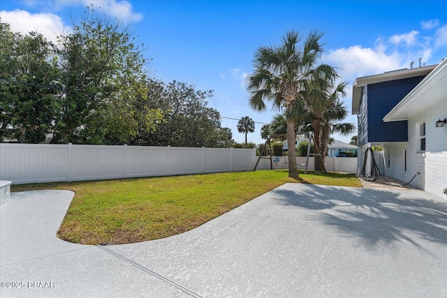 view of yard with a fenced backyard and a patio