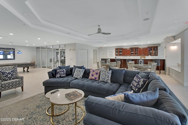 living area featuring recessed lighting, a raised ceiling, ceiling fan, and billiards