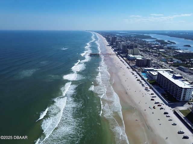 bird's eye view featuring a city view, a beach view, and a water view