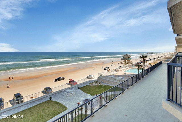 view of water feature with a beach view