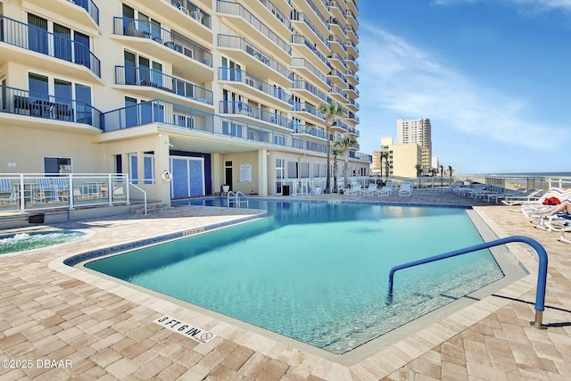 pool featuring a patio area